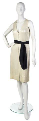 A Bill Blass Cream Sequin Cocktail Dress,: A Bill Blass Cream Sequin Cocktail Dress, with a navy silk chiffon sash belt, deep V-back. Labeled: Bill Blass.