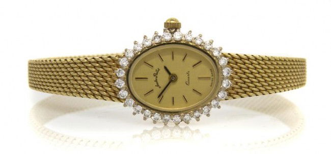 A 14 Karat Yellow Gold and Diamond Wristwatch, And: A 14 Karat Yellow Gold and Diamond Wristwatch, Andre Pailet, containing 28 round brilliant cut diamonds weighing approximately 0.56 carat total, matte gilt dial, applied baton numerals, black baton ha