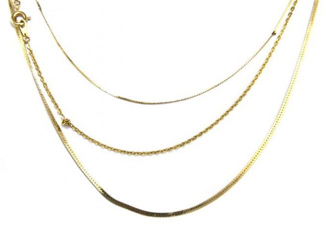 A Group of 14 Karat Yellow Gold Chains, 3.50 dwts.: A Group of 14 Karat Yellow Gold Chains, consisting of three chains. 3.50 dwts.