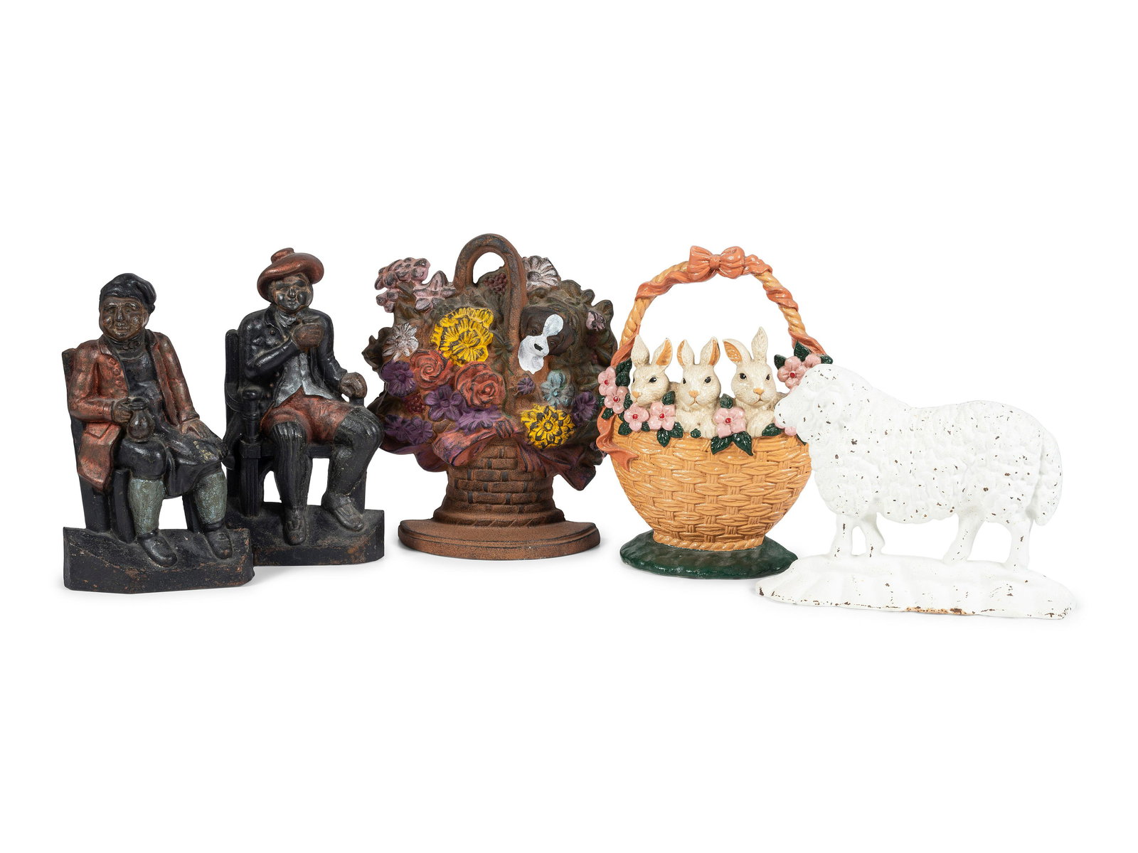 Five Figural Cast Iron Doorstops: Five Figural Cast Iron Doorstops 20th Century Height of largest 10 5/8 inches. Property from the Estate of Shirley Kay Caskey, Rochester, Minnesota