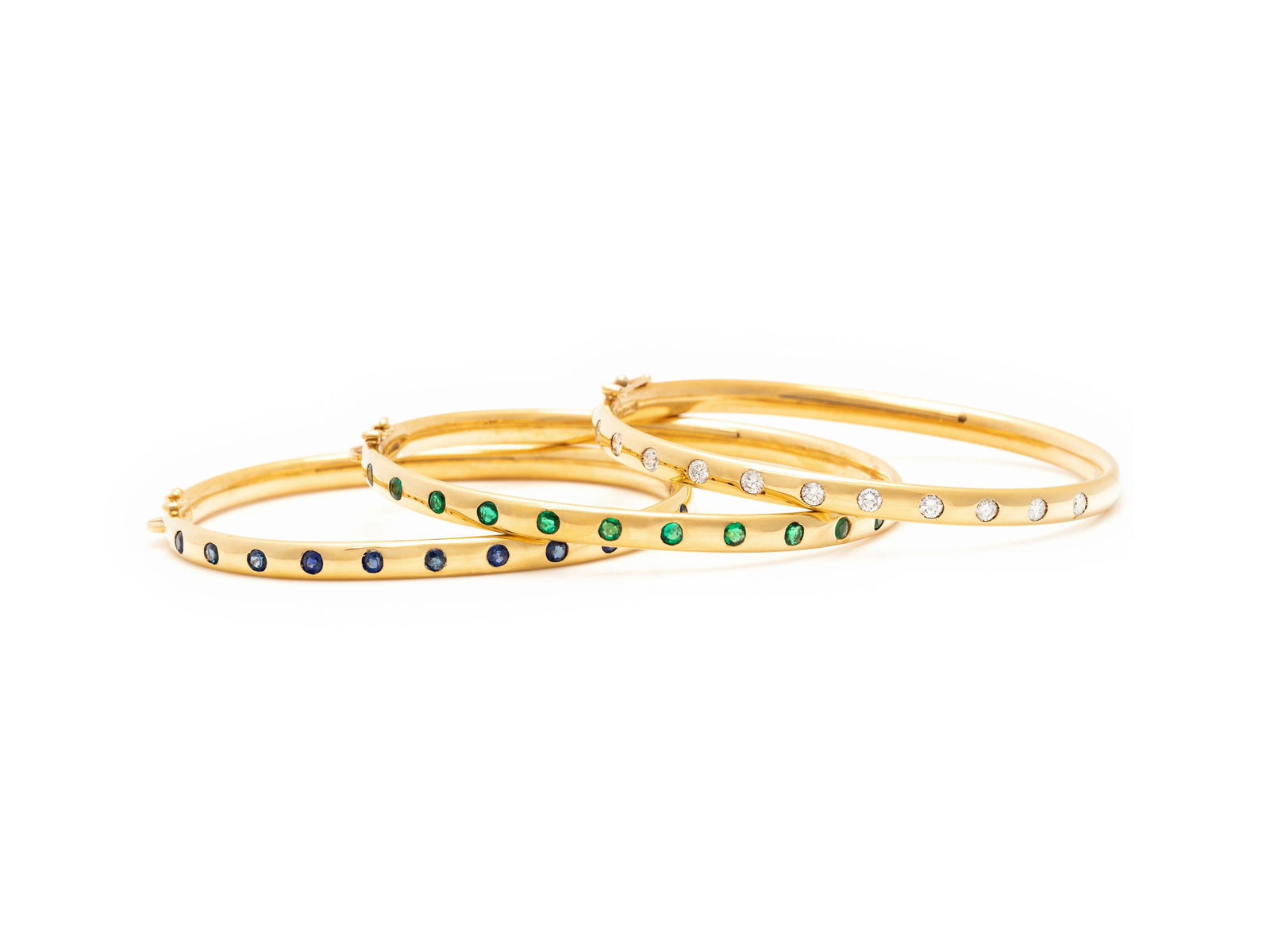 SCHLUGER, YELLOW GOLD, DIAMOND AND GEMSTONE BANGLE SET (1 of 2)