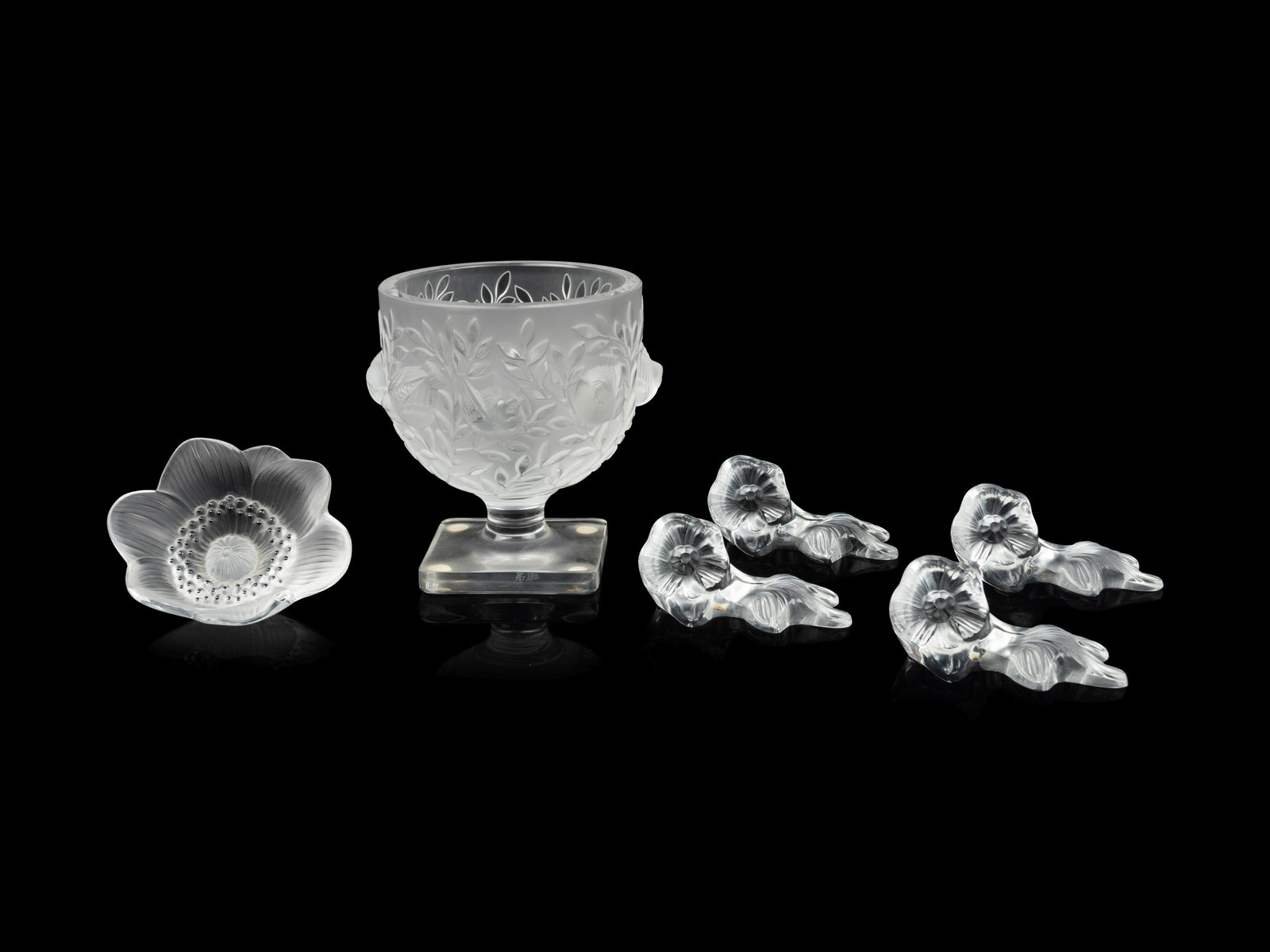 A Lalique Elisabeth Vase, Anemone Ornament and Four Floral Ornaments Height of first 5 3/8 inches. (1 of 5)