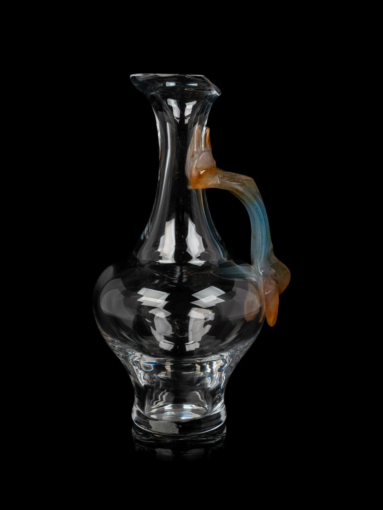 A Daum Glass Pitcher with a Pate de Verre Handle Height 12 1/2 inches.: A Daum Glass Pitcher with a Pate de Verre Handle Second Half 20th Century with acid-etchedDaum/ France mark to base. Height 12 1/2 inches.