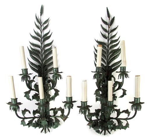 A Pair of Tole Five-Light Sconces, Height 39 inches: A Pair of Tole Five-Light Sconces, each having a leaf form backplate issuing the foliate candle arms. Height 39 inches.