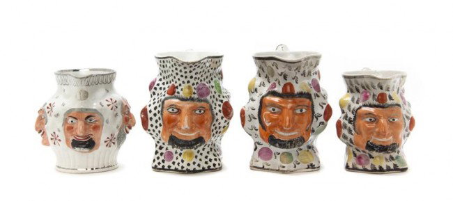 A Collection of Four English Pottery Toby Jugs, He: A Collection of Four English Pottery Toby Jugs, each with polychrome decoration. Height of tallest 5 7/8 inches.