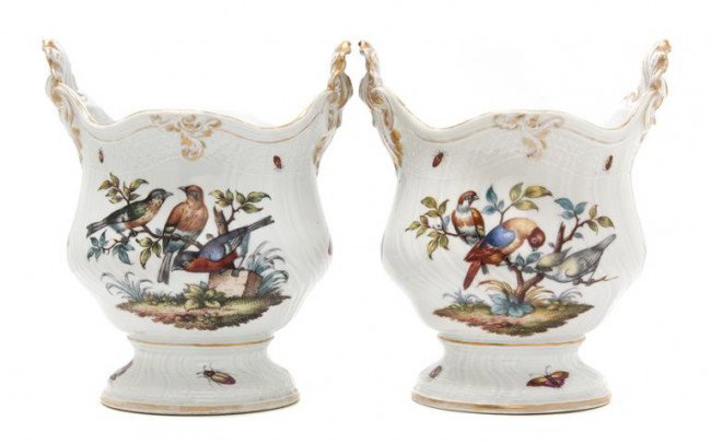 A Pair of Dresden Porcelain Jardinieres, Helena Wo: A Pair of Dresden Porcelain Jardinieres, Helena Wolfsohn, having shell form handles, decorated with birds and insects, raised on a circular foot, having Augustus Rex mark. Height 10 1/4 inches. Proper