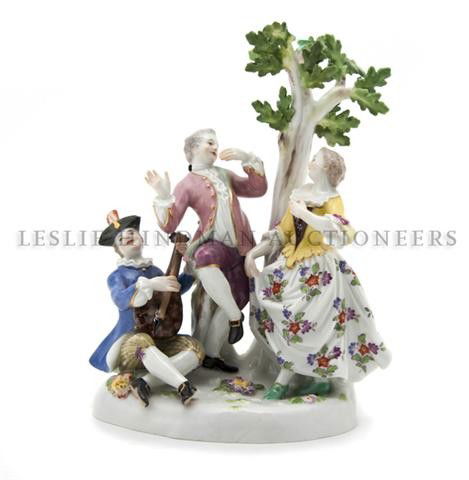 A Meissen Porcelain Figural Group, Height 6 5/8 in: A Meissen Porcelain Figural Group, 19th century, depicting revellers beneath a tree, impressed 36, incised 662, having crossed dotted swords mark in underglaze blue. Height 6 5/8 inches.