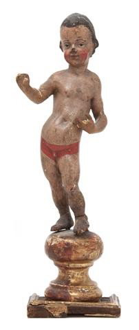 A Carved and Polychrome Decorated Santos Figure, H: A Carved and Polychrome Decorated Santos Figure, depicting a boy on a finial base. Height 17 inches. Property from the Collection of Mr. and Mrs. John F. Monroe, Milwaukee, Wisconsin