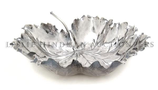 An Italian Silver Center Bowl, Buccellati, Diamete: An Italian Silver Center Bowl, Buccellati, in the form of a leaf; approximate weight 10.19 ozt. Diameter 9 inches.