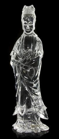 A Chinese Rock Crystal Figure of Guanyin, Height 16: A Chinese Rock Crystal Figure of Guanyin, the figured depicted in a standing pose wearing flowing robes. Height 16 1/2 inches. Property from the William H. Moore Trust, Hobe Sound, Florida