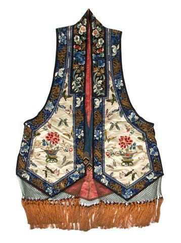 A Chinese Embroidered Woman's Vest, Height 39 inche: A Chinese Embroidered Woman's Vest, the main panel having cream colored reserve decorated with embroidered floral arrangements and butterflies including gold wrapped thread, the bottom with green nett