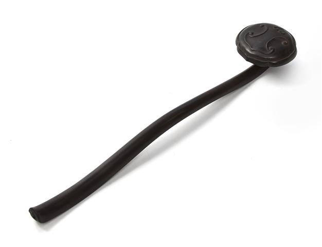 A Chinese Zitan Wood Ruyi Scepter, Length 13 1/4 i: A Chinese Zitan Wood Ruyi Scepter, of dark hardwood with Jiaqing mark on the handle. Length 13 1/4 inches.