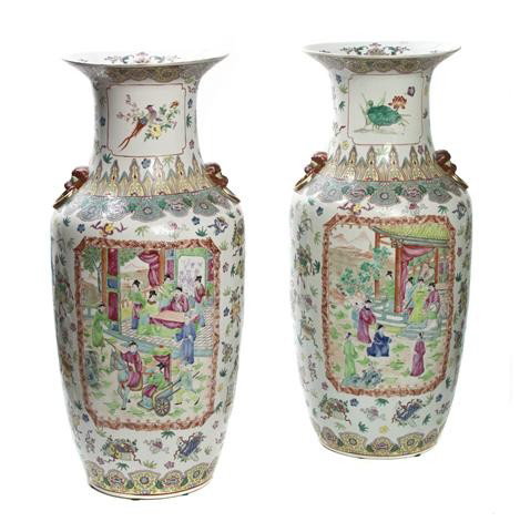 A Pair of Chinese Baluster Vases, Height 24 inches: A Pair of Chinese Baluster Vases, having famille rose decoration throughout, with panels depicting indoor figural scenes in two main cartouches, surrounded by various Buddhist emblems and floral spray