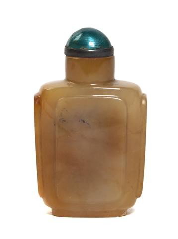 A Chinese Hardstone Snuff Bottle, Height 2 1/2 inc: A Chinese Hardstone Snuff Bottle, of flattened rectangular form, of yellow stone having enameled blue stopper. Height 2 1/2 inches. Property from the Collection of Dr. Samuel Grant, Chicago, Illinois