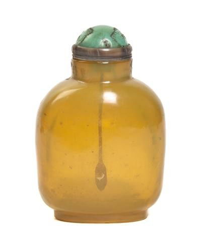 A Yellow Glass Snuff Bottle, Height of bottle 3 in: A Yellow Glass Snuff Bottle, of compressed globular form with silver and turquoise stopper. Height of bottle 3 inches. Property from the Collection of Dr. Samuel Grant, Chicago, Illinois