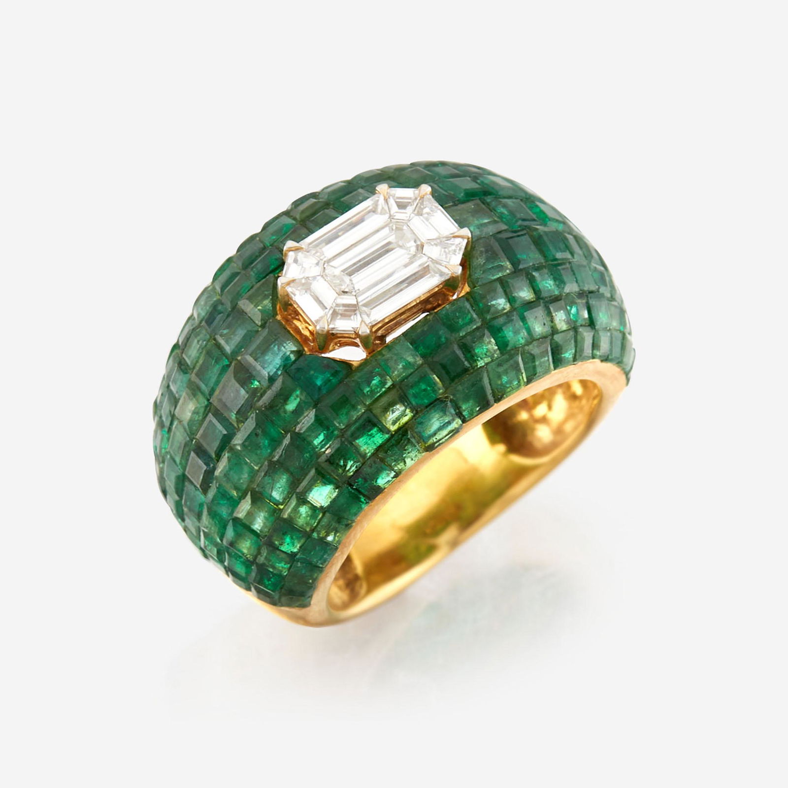 An emerald, diamond, and gold ring (1 of 3)