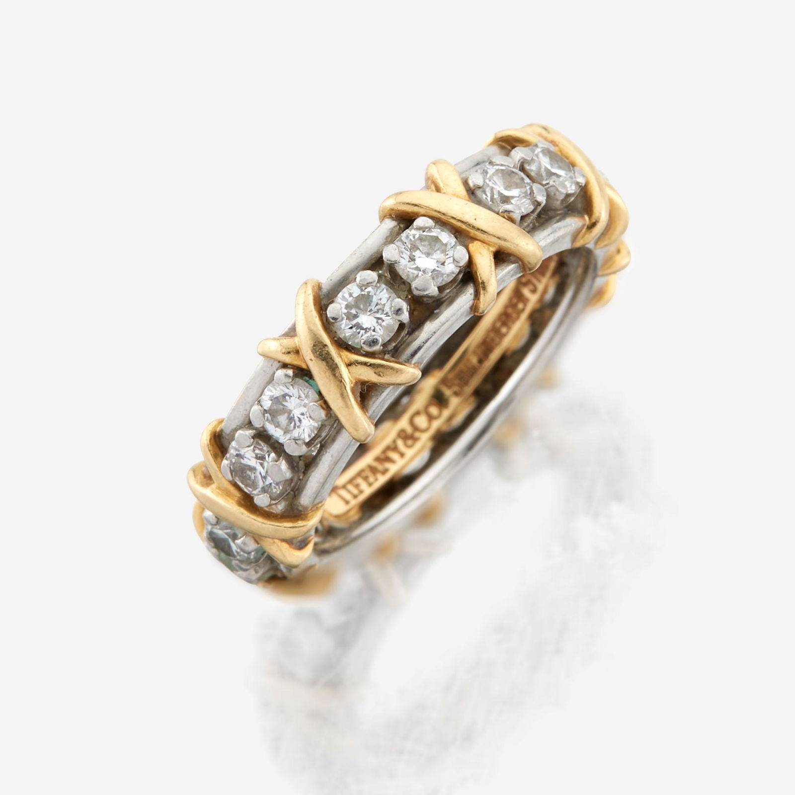 A gold, platinum, and diamond band, Tiffany & Co. Schlumberger Studios (1 of 3)