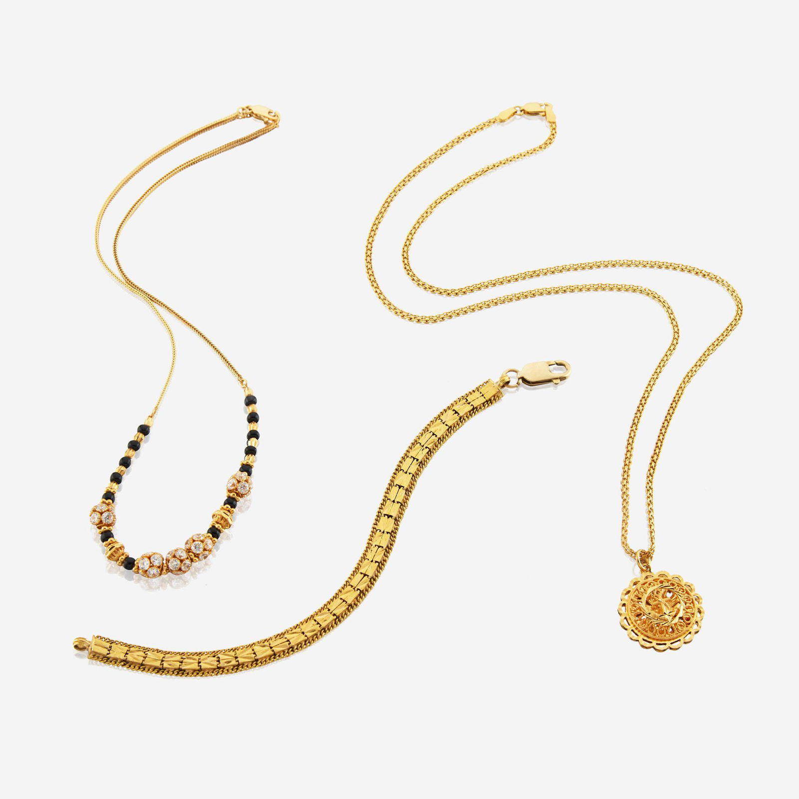 A collection of high karat gold jewelry (1 of 3)