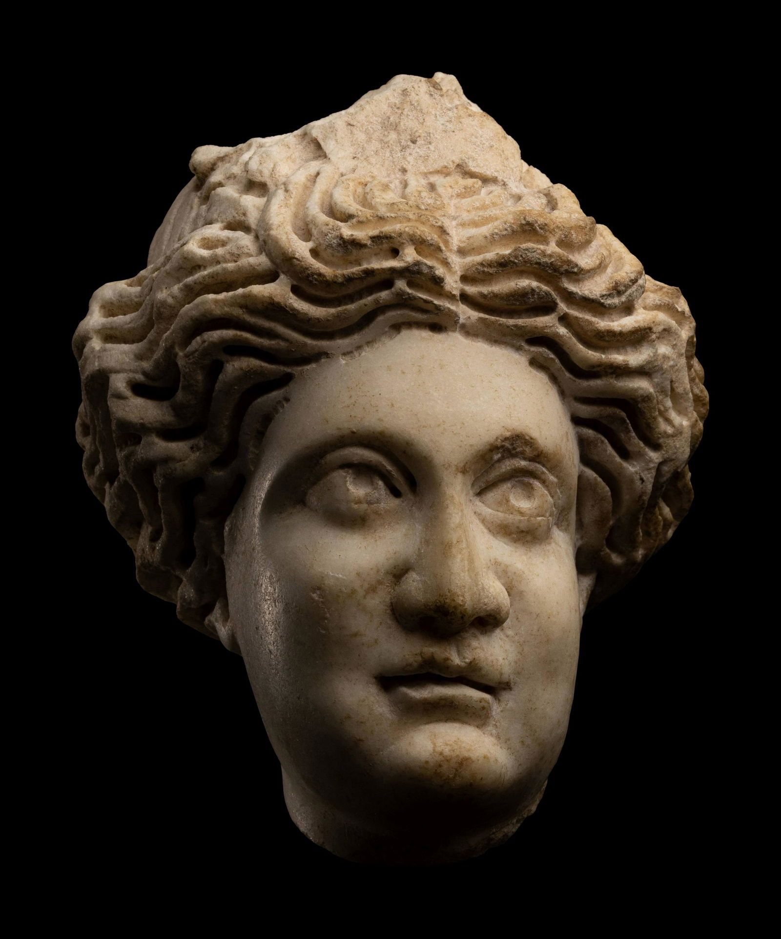 A Roman Marble Head of a Woman Height 5 inches (12.7 cm). (1 of 3)