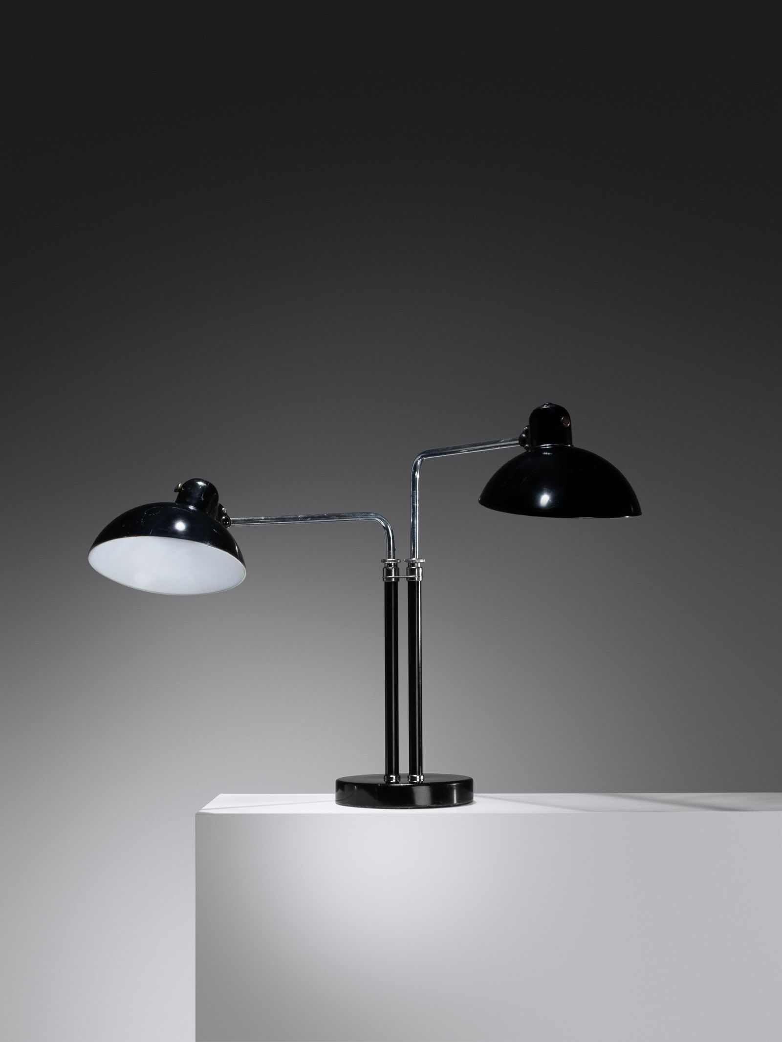 Christian Dell (1893-1974) Double Dell Table Lamp, c. 1933 Kaiser Idell, Germany: Christian Dell (1893-1974) Double Dell Table Lamp, c. 1933 Kaiser Idell, Germany enameled steel, chrome-plated brass, Bakelite with manufacturer's stamp H 20 x W 37 x D 8 inches, adjustable