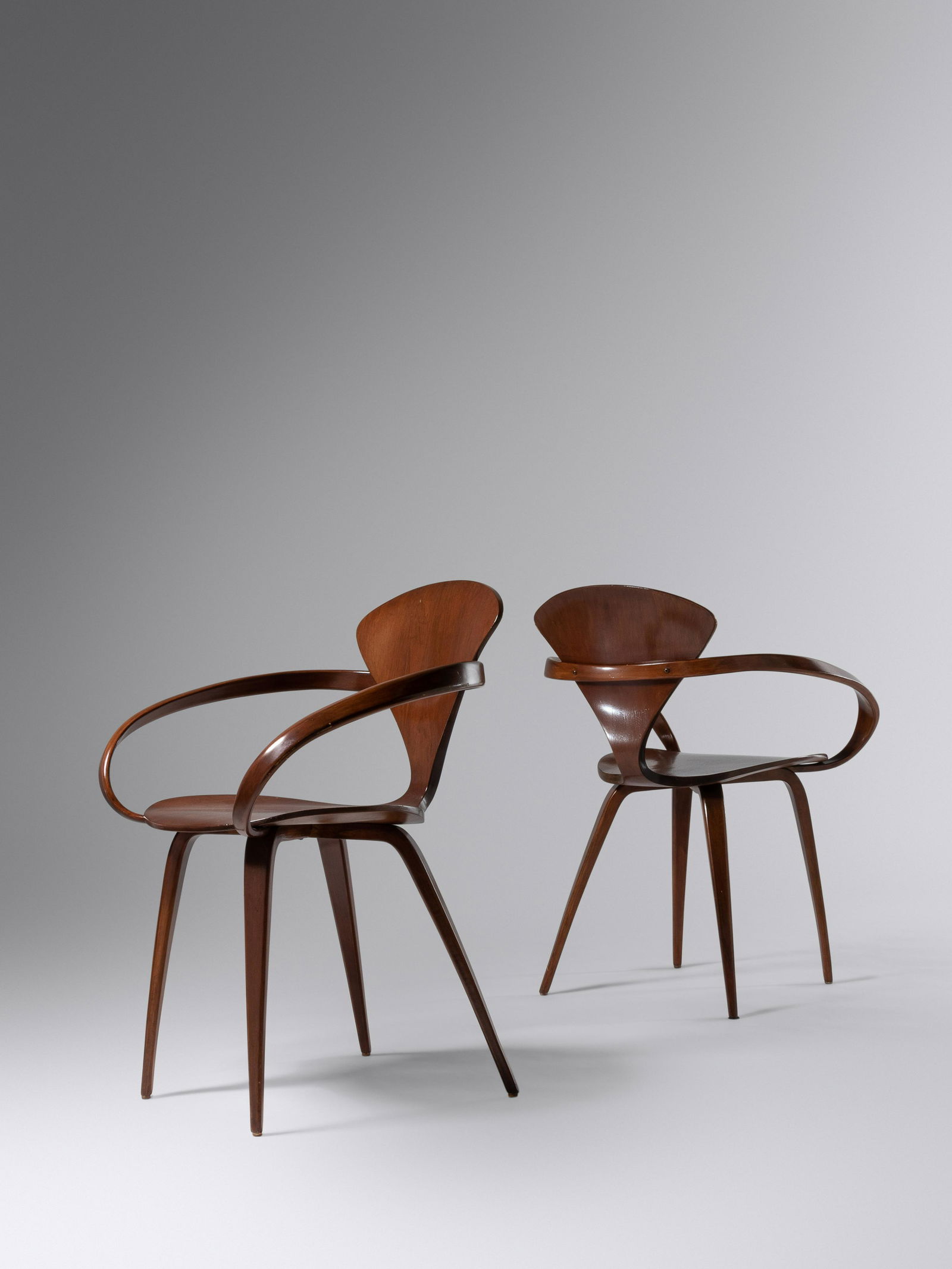 Norman Cherner (1920-1987) Pair of Armchairs Plycraft, USA: Norman Cherner (1920-1987) Pair of Armchairs Plycraft, USA walnut, plywood with manufacturer's decal H 32 x W 27 x D 22 inches