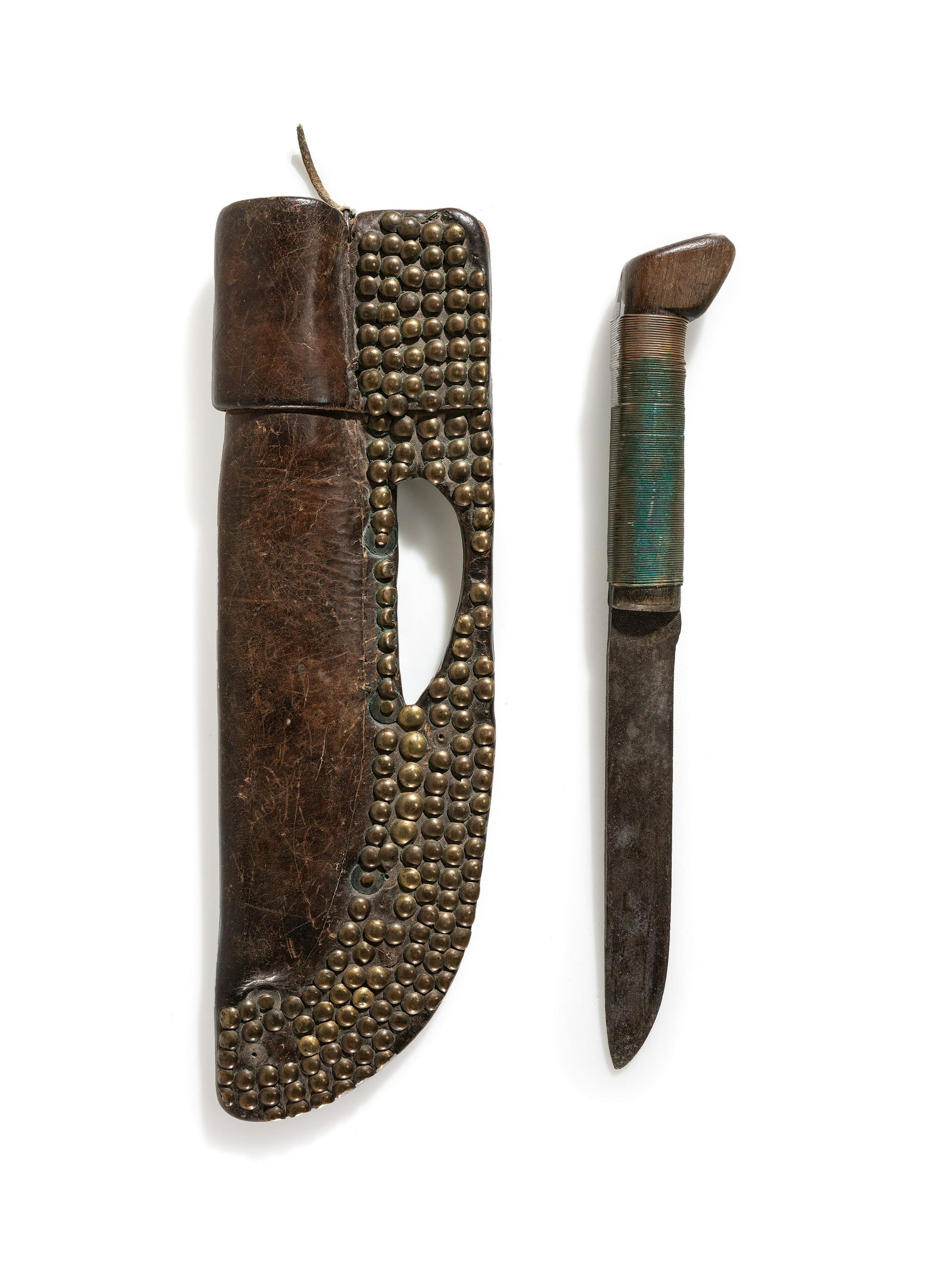 Northern Plains Tacked Knife Sheath, with Knife: Northern Plains Tacked Knife Sheath, with Knife third quarter 19th century leather knife sheath studded with approximately 180 brass tacks and copper rivets; repurposed file crafted into a knife; wood