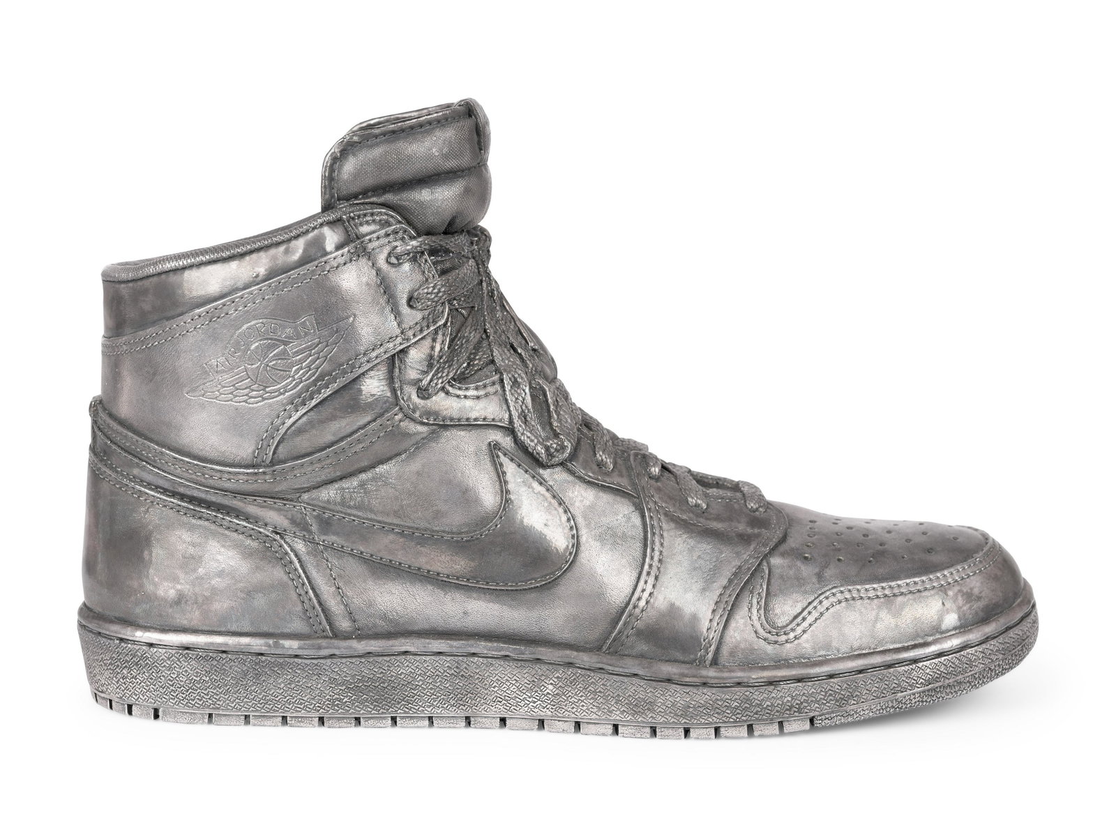 A Nike Air Jordan 1 Silver Cast Basketball Shoe Crafted for Michael Jordan's 32nd Birthday (1 of 11)