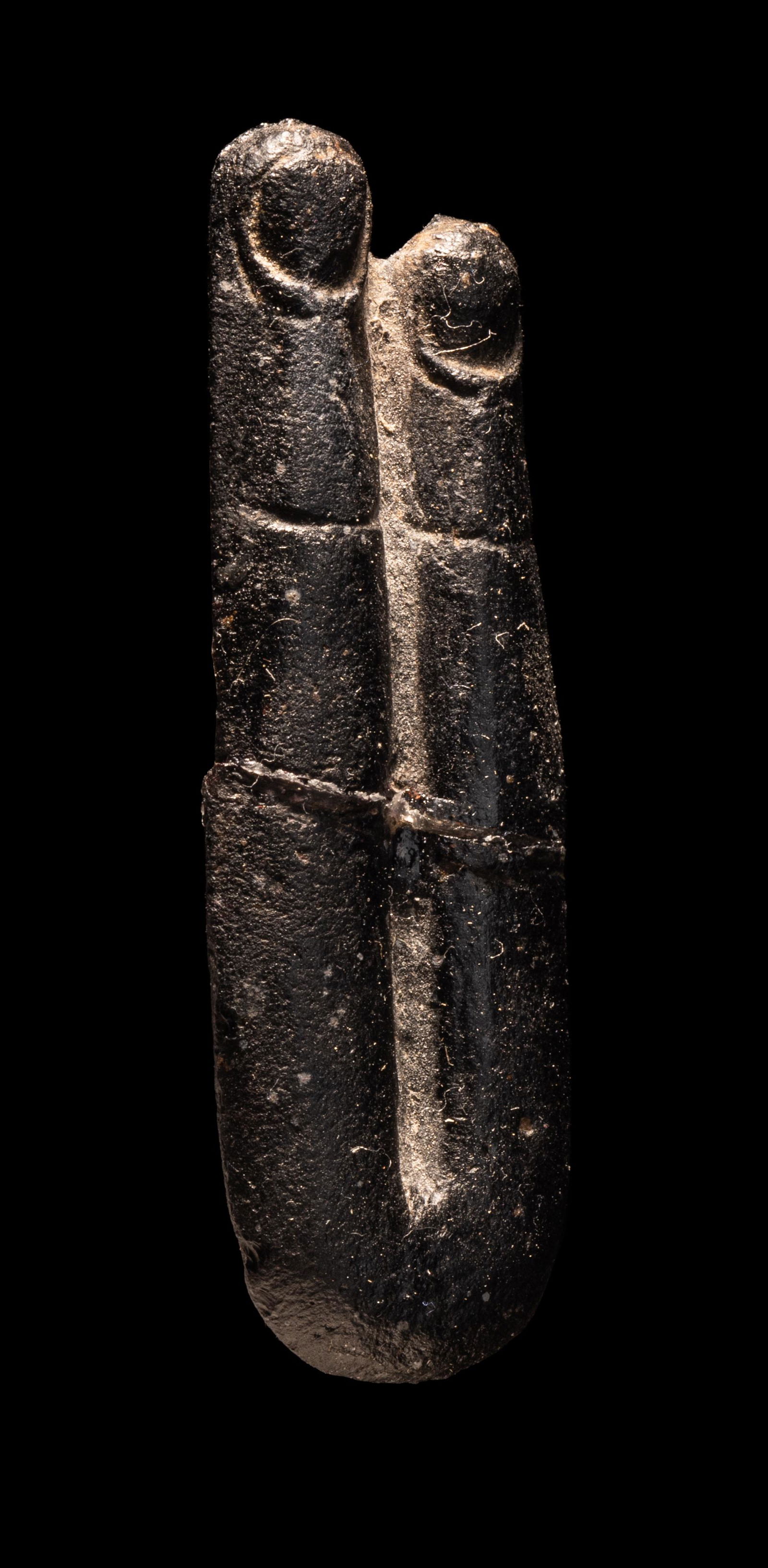 An Egyptian Stone Two-Finger Amulet Length 2 3/16 inches (6 cm). (1 of 3)