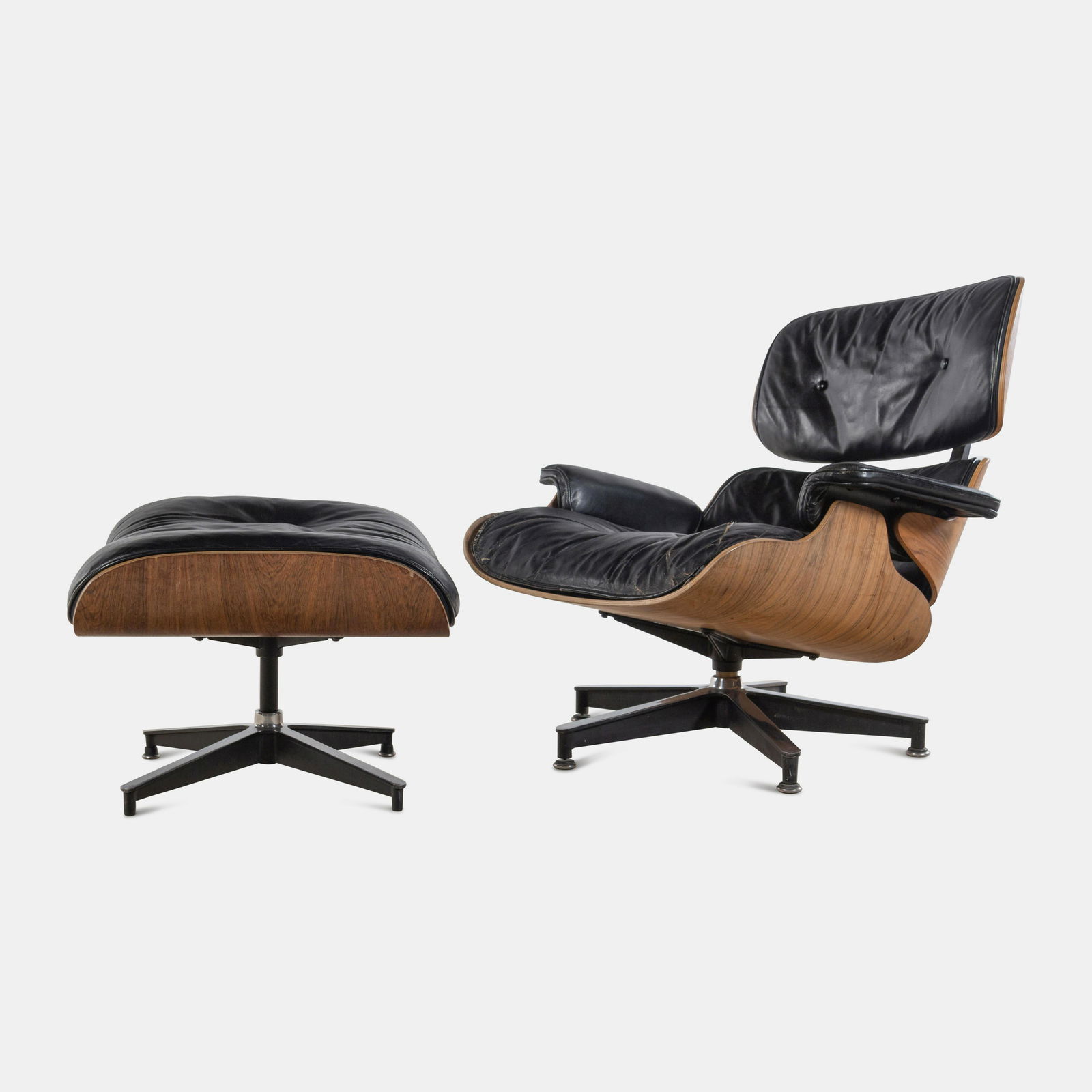 Charles and Ray Eames (American, 1907-1978 | American, 1912-1988) Lounge Chair and Ottoman, model (1 of 4)