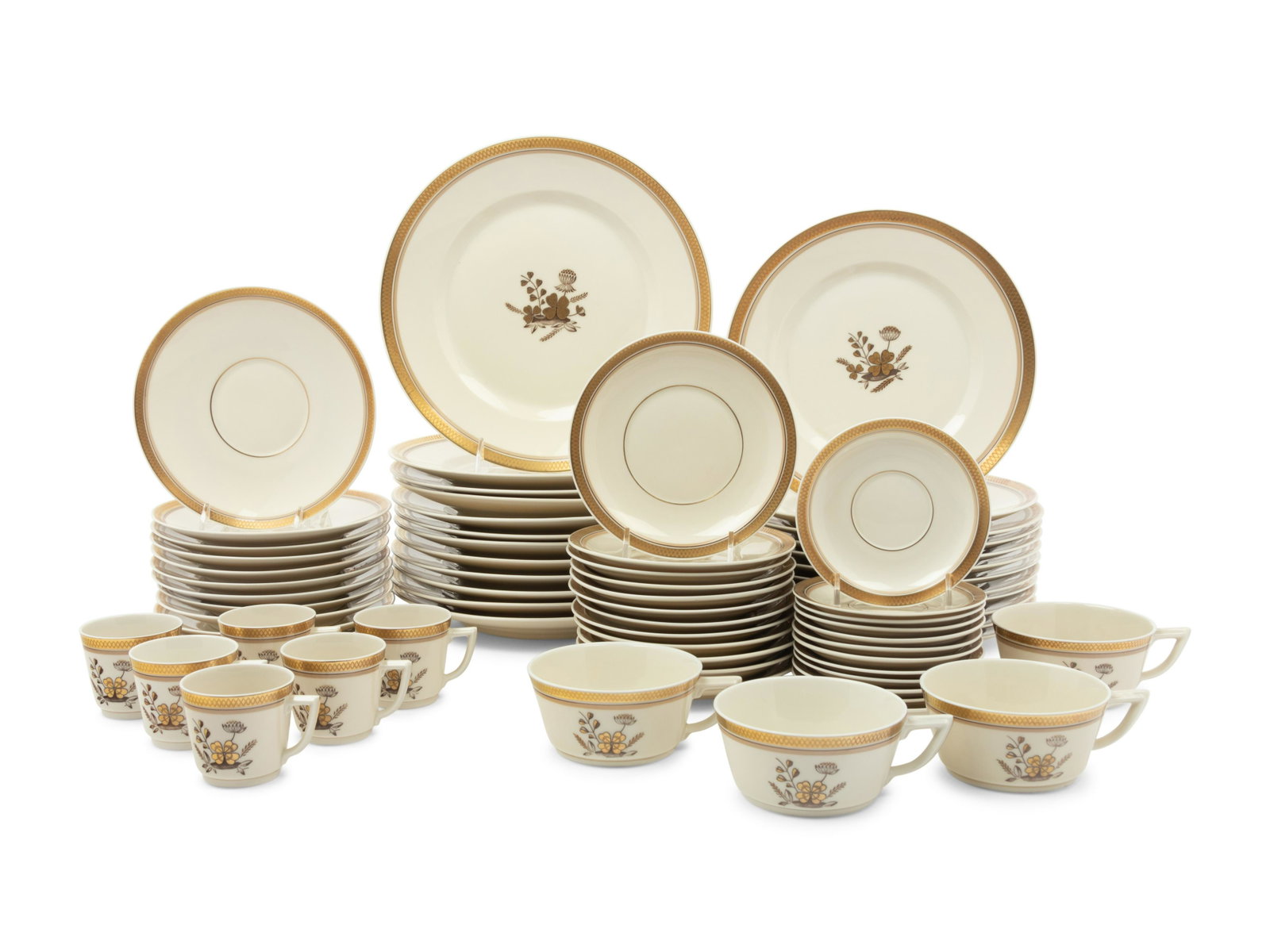 A Royal Copenhagen Golden Clover Porcelain Service for Twelve: A Royal Copenhagen Golden Clover Porcelain Service for Twelve 20th Century comprising 12 dinner plates, 12 salad plates, 21 cream soup bowls with 22 underplates, 13 coffee cups with 12 saucers, 12 tea