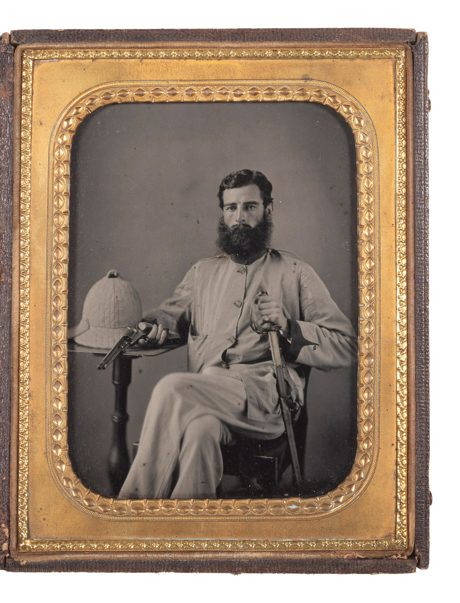 [EARLY PHOTOGRAPHY] -- [MILITARIA]. Half plate ambrotype of a double-armed British soldier with: [EARLY PHOTOGRAPHY] -- [MILITARIA]. Half plate ambrotype of a double-armed British soldier with companion CDV. Ca 1857-1858. Half plate ambrotype (small fleabites to enamel); housed in full leat