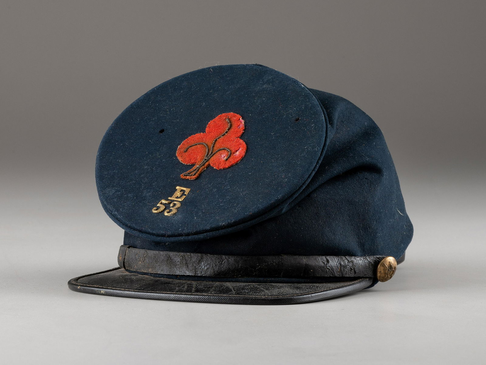 [CIVIL WAR]. 53rd Pennsylvania forage cap with insignia and II Corps, 1st Division badge. (1 of 7)