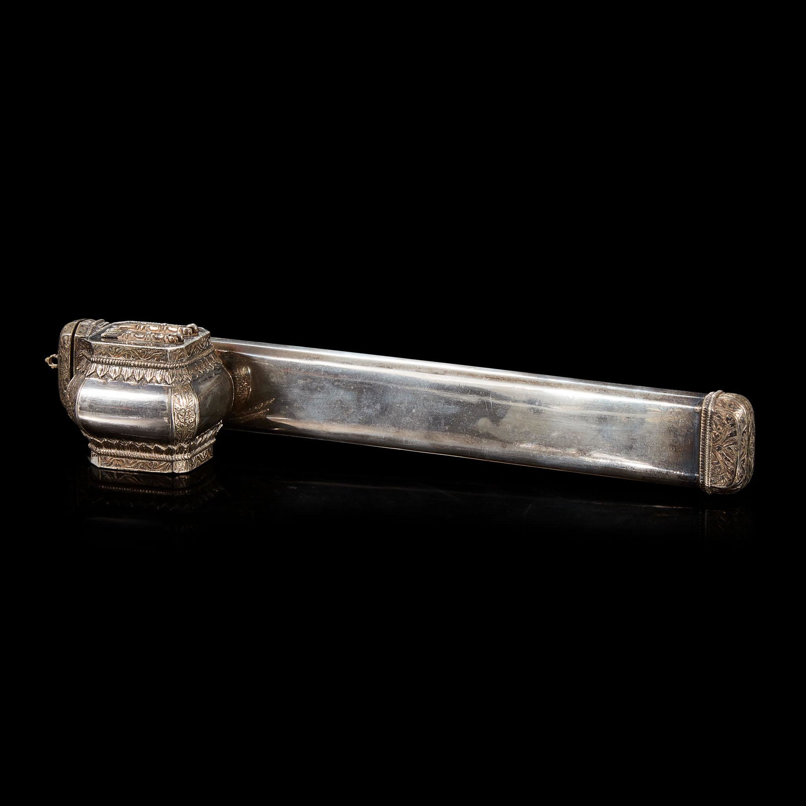 An Ottoman or Egyptian parcel-gilt silver qalamdan: Stamped mark to back and also to underside of the inkwell (L: 10 1/4 in.) PROVENANCE: Property from a private collection, Pittsburgh, Pennsylvania