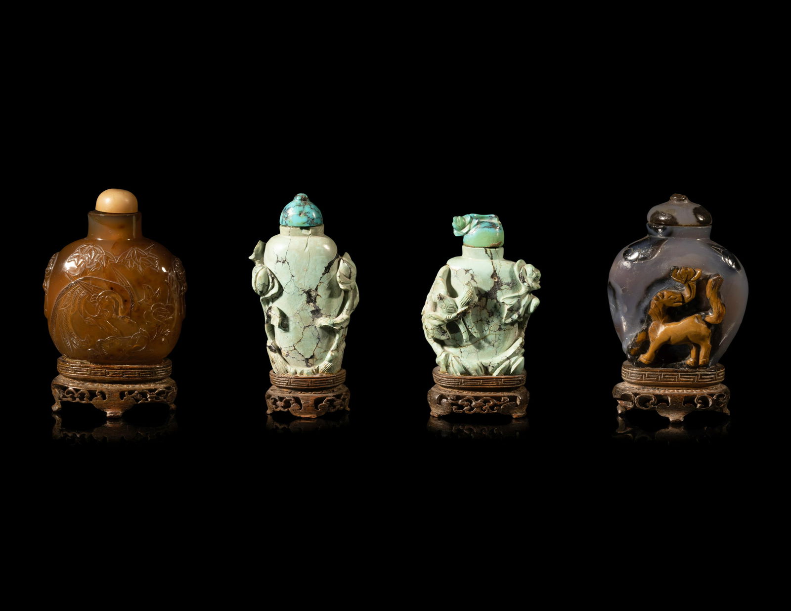 Four Chinese Carved Hardstone Snuff Bottles (1 of 3)
