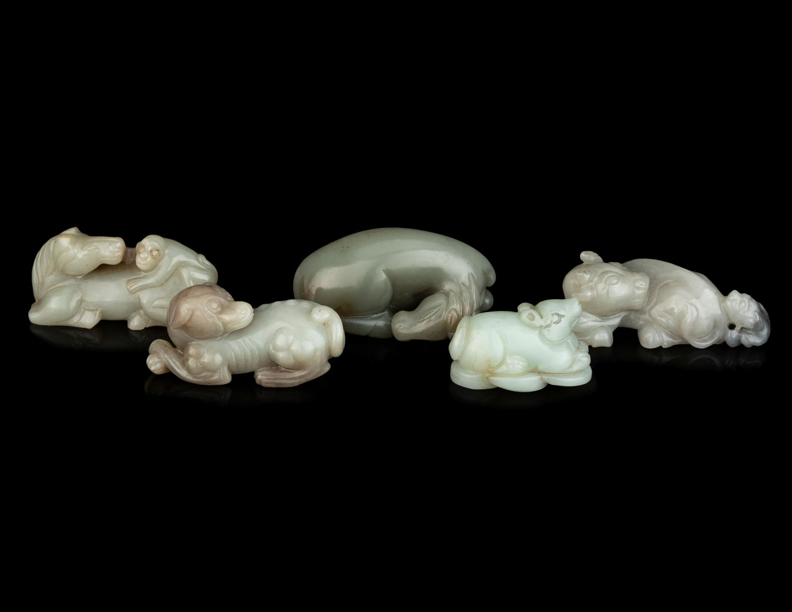 Five Chinese Carved Celadon Jade Figures of Recumbent Animals (1 of 3)