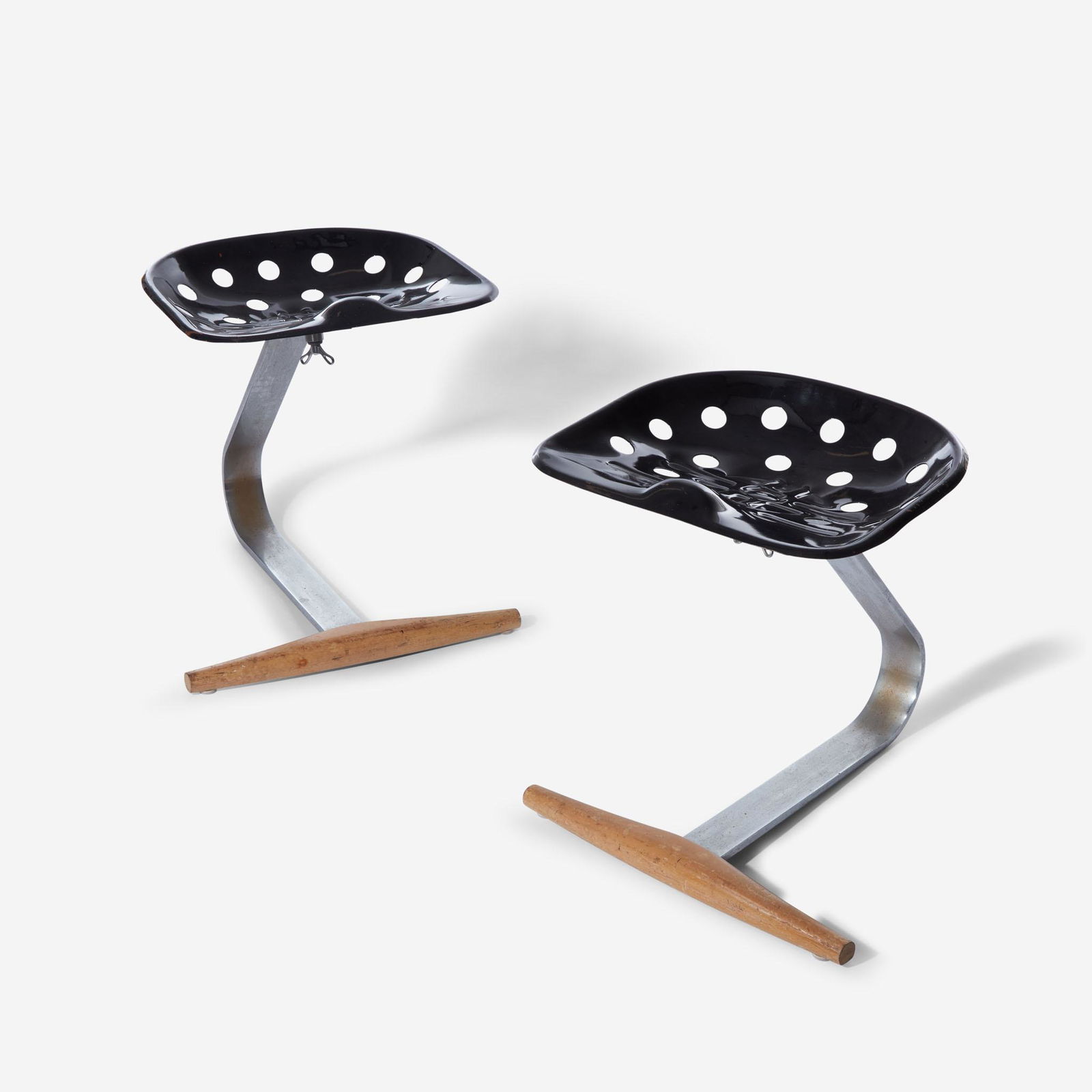 Achille and Pier Giacomo Castiglioni A Pair of "Mezzadro" stools, Zanotta, Italy, designed 1957, the (1 of 3)