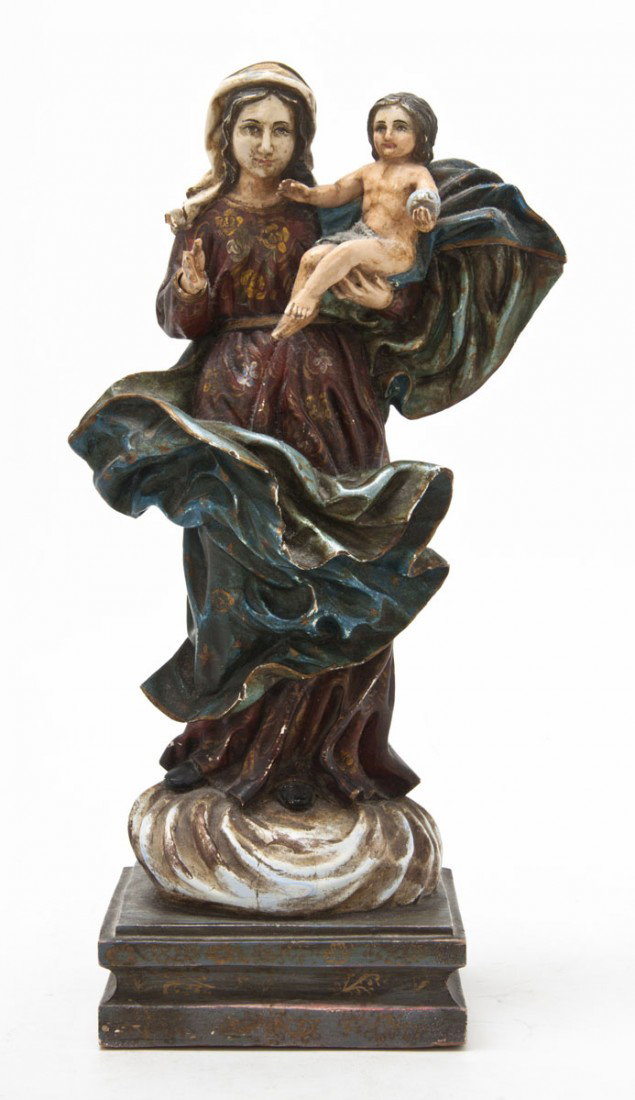 An Ecuadorian Carved Wood and Polychrome Decorated: An Ecuadorian Carved Wood and Polychrome Decorated Figural Group, depicting the Virgin Mary with the Christ Child. Width 8 inches. Property from the Collection of Mr. and Mrs. John F. Monroe, Milwauke