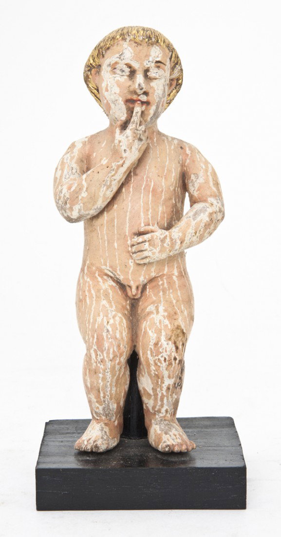 A Continental Carved and Polychrome Decorated Sant: A Continental Carved and Polychrome Decorated Santos Figure, set on a wood base with pressed metal accents. Height 5 1/4 inches. Property from the Collection of Mr. and Mrs. John F. Monroe, Milwaukee,