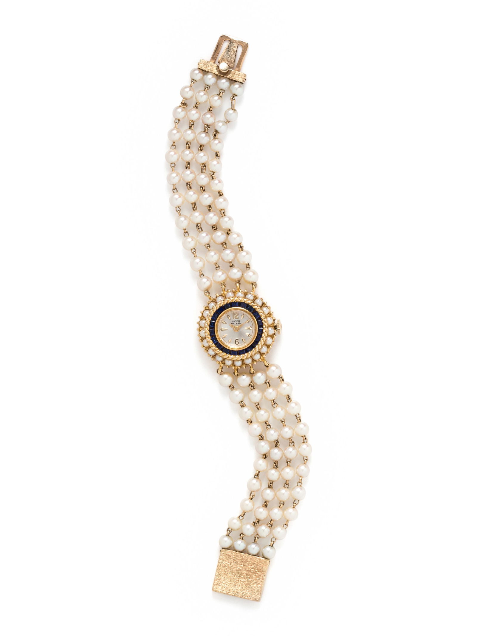 LUCIEN PICCARD, 14K YELLOW GOLD AND CULTURED PEARL WRISTWATCH : LUCIEN PICCARD, 14K YELLOW GOLD AND CULTURED PEARL WRISTWATCH 23.00 mm case diameter, the bezel containing numerous pearls and square step cut blue stones, matte silvered dial, applied gold and