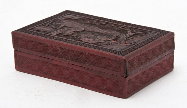 A Cinnabar Lacquer Box, Width 5 5/8 inches.: A Cinnabar Lacquer Box, of rectangular form, with a lid depicting two scholars. Width 5 5/8 inches.