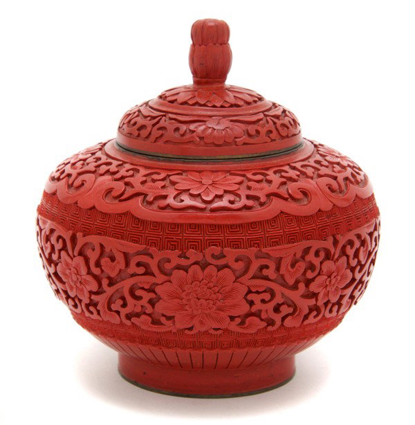 A Group of Two Lidded Cinnabar Lacquer Vessels, He: A Group of Two Lidded Cinnabar Lacquer Vessels, having domed lid with chrysanthemum form finial with multiple bands of scrolling decoration, together with a lidded cylindrical box. Height of tallest 6