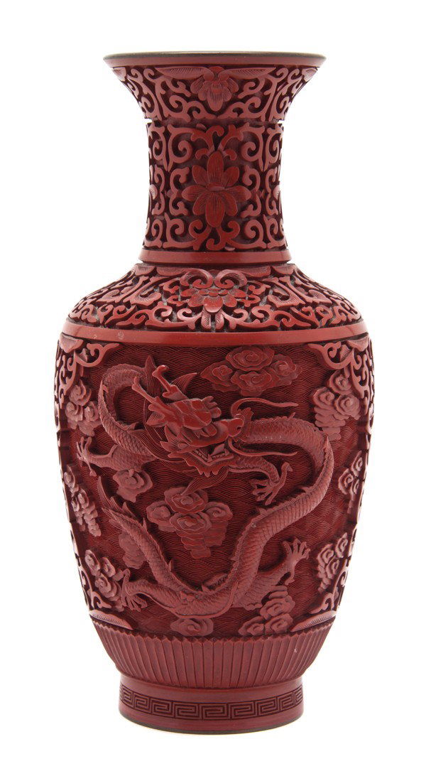 A Chinese Cinnabar Lacquer Vase, Height 10 1/4 inc: A Chinese Cinnabar Lacquer Vase, decorated with a dragon, unmarked. Height 10 1/4 inches.