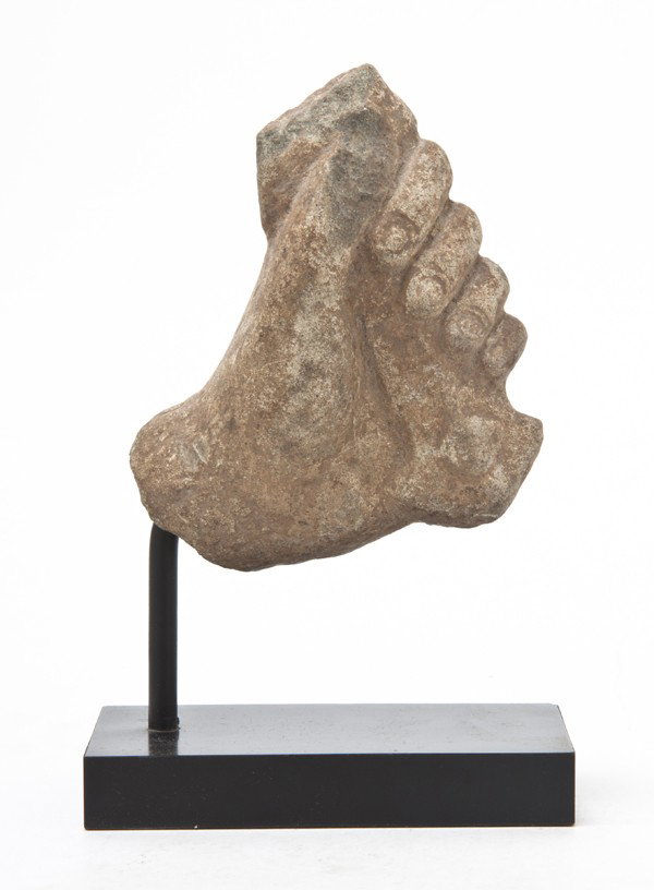 A Southeast Asian Stone Model of a Hand, Width 5 i: A Southeast Asian Stone Model of a Hand, the fragment of naturalistic form. Width 5 inches. Property from the Collection of Mr. and Mrs. John F. Monroe, Milwaukee, Wisconsin