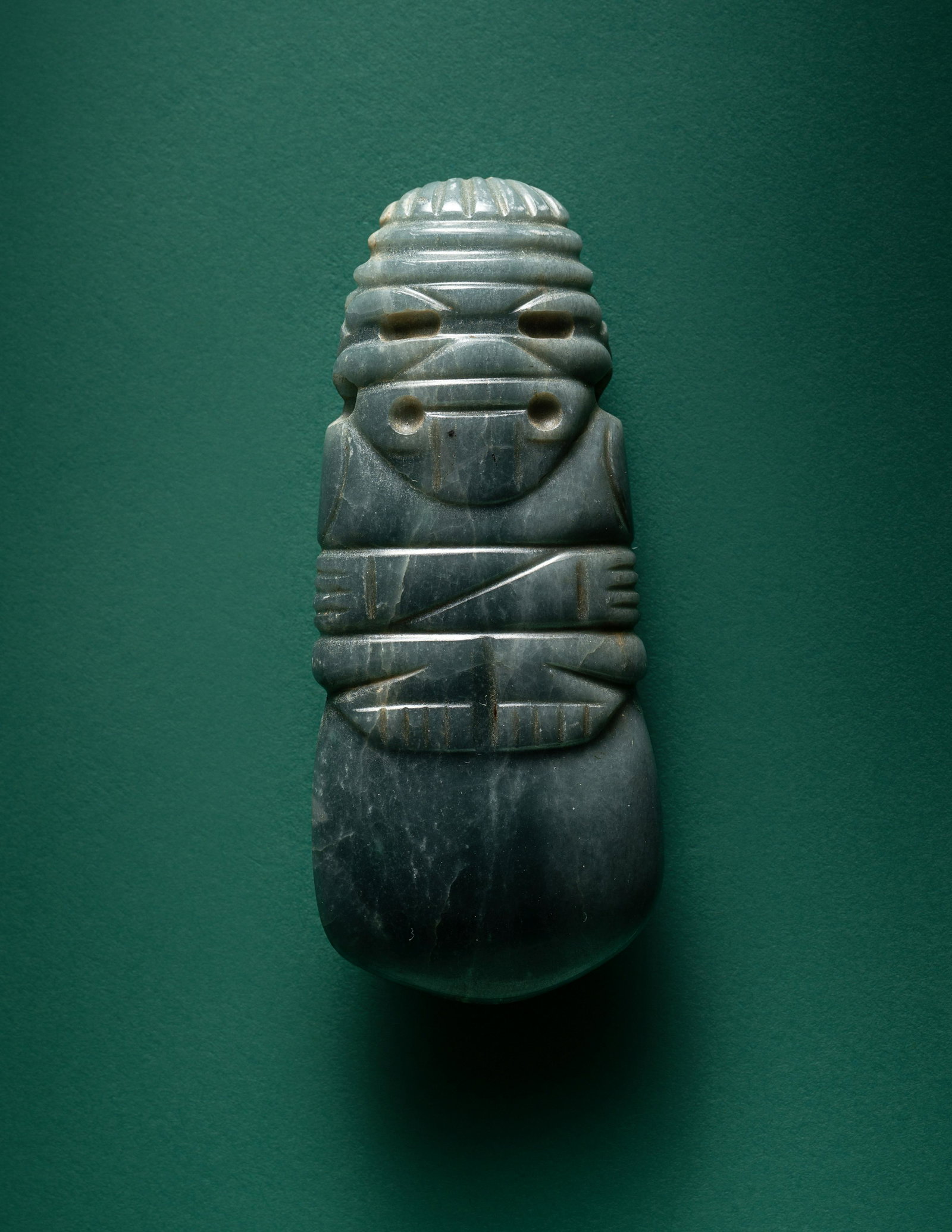 A Costa Rican Jade Axe God Pendant Length 3 inches (7.6 cm). (1 of 3)