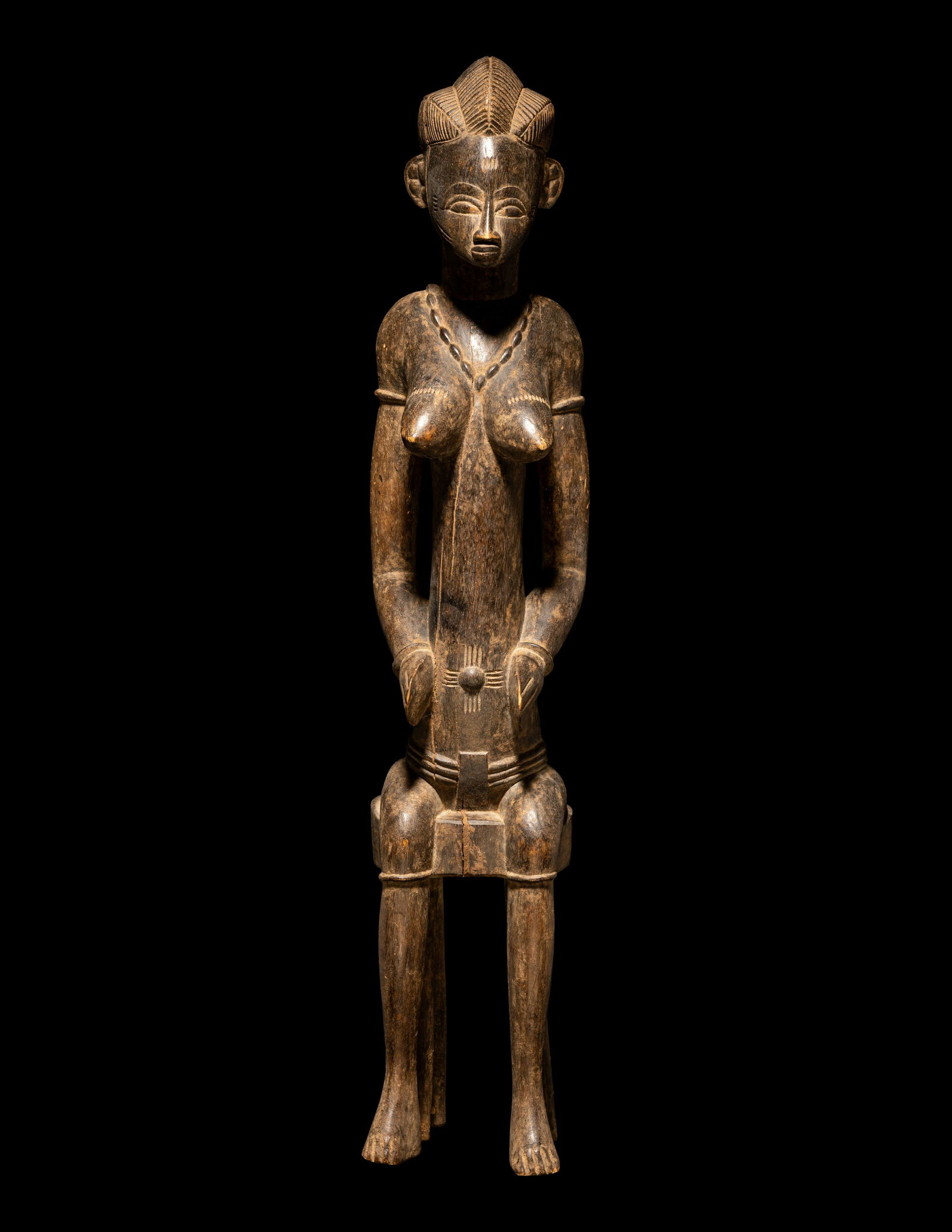 A Senufo Wood Female Figure Height 26 3/16 inches (67 cm). (1 of 4)