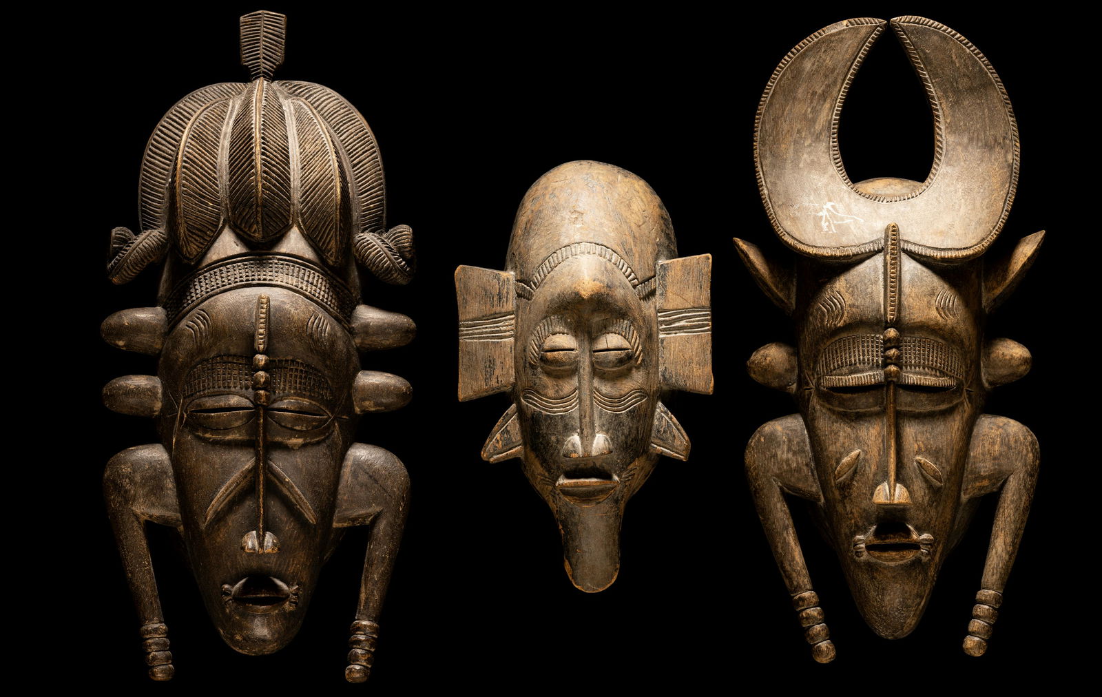 Three Senufo Wood Masks Height of largest 17 5/16 inches (44 cm). (1 of 13)