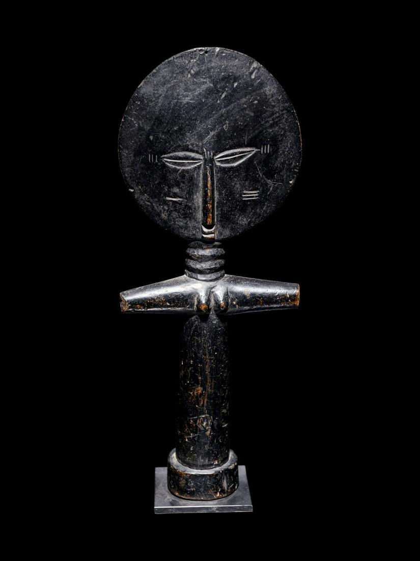 An Ashanti Wood Fertility Figure Height 13 3/4 inches (34.9 cm). (1 of 4)