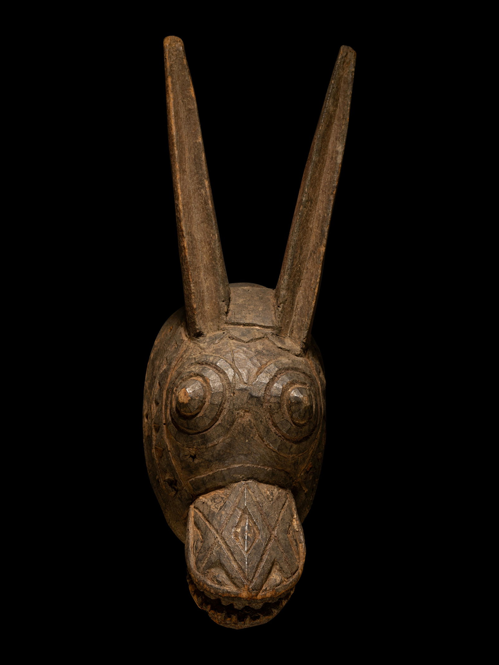 A Mossi Wood Mask Length 17 7/8 inches (45.5 cm).: A Mossi Wood Mask West Africa, Mali Length 17 7/8 inches (45.5 cm). Property from the Museum of Fine Arts, St. Petersburg, Florida Provenance: Gifted in 1994 (Inv. no. T1994.004.002).