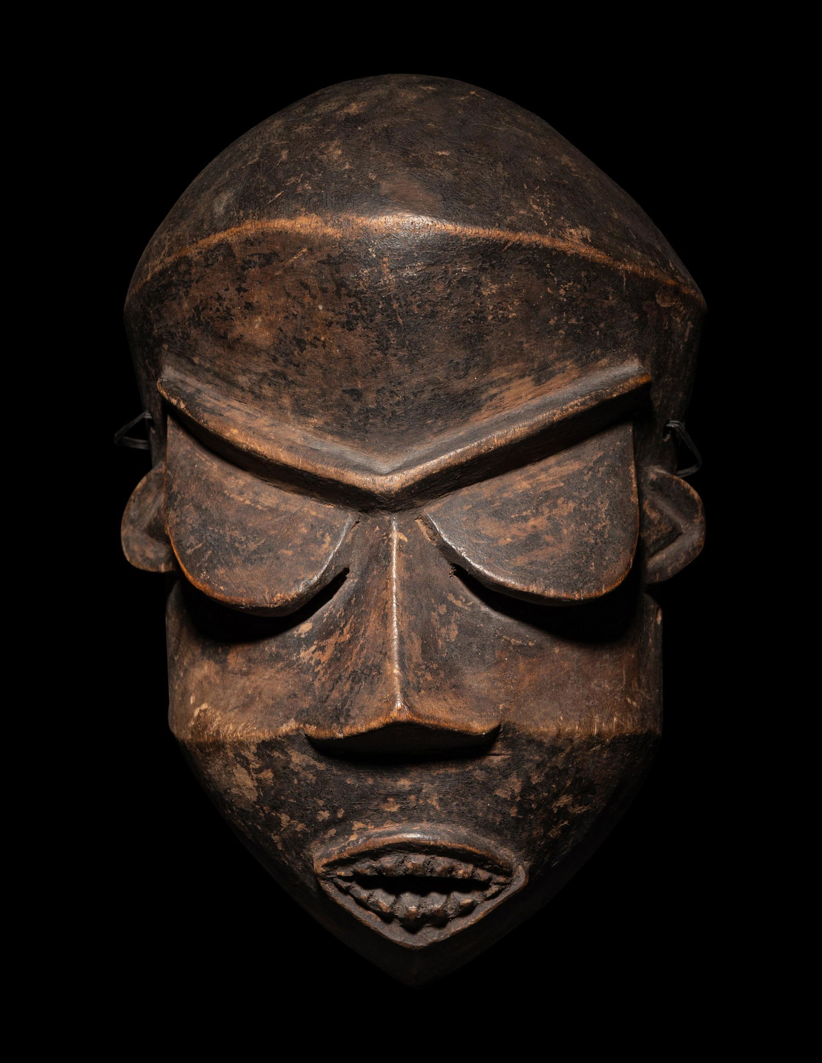 A Pende Wood Mask (Mbuya) Height 9 7/8 inches (25.1 cm). (1 of 4)