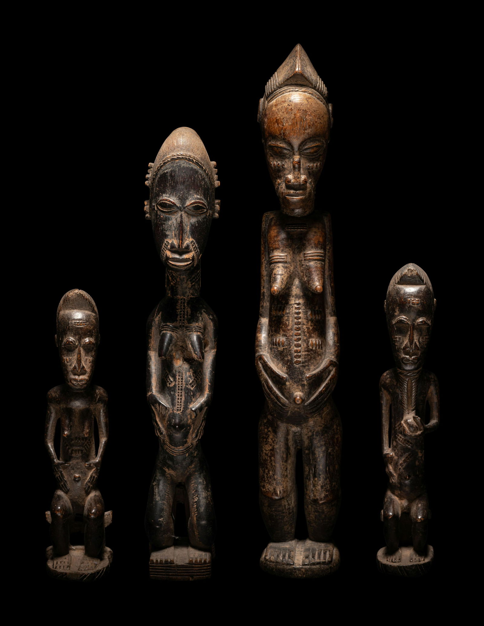 Four African Wood Figures Height of largest 21 19/32 inches (55 cm). (1 of 15)